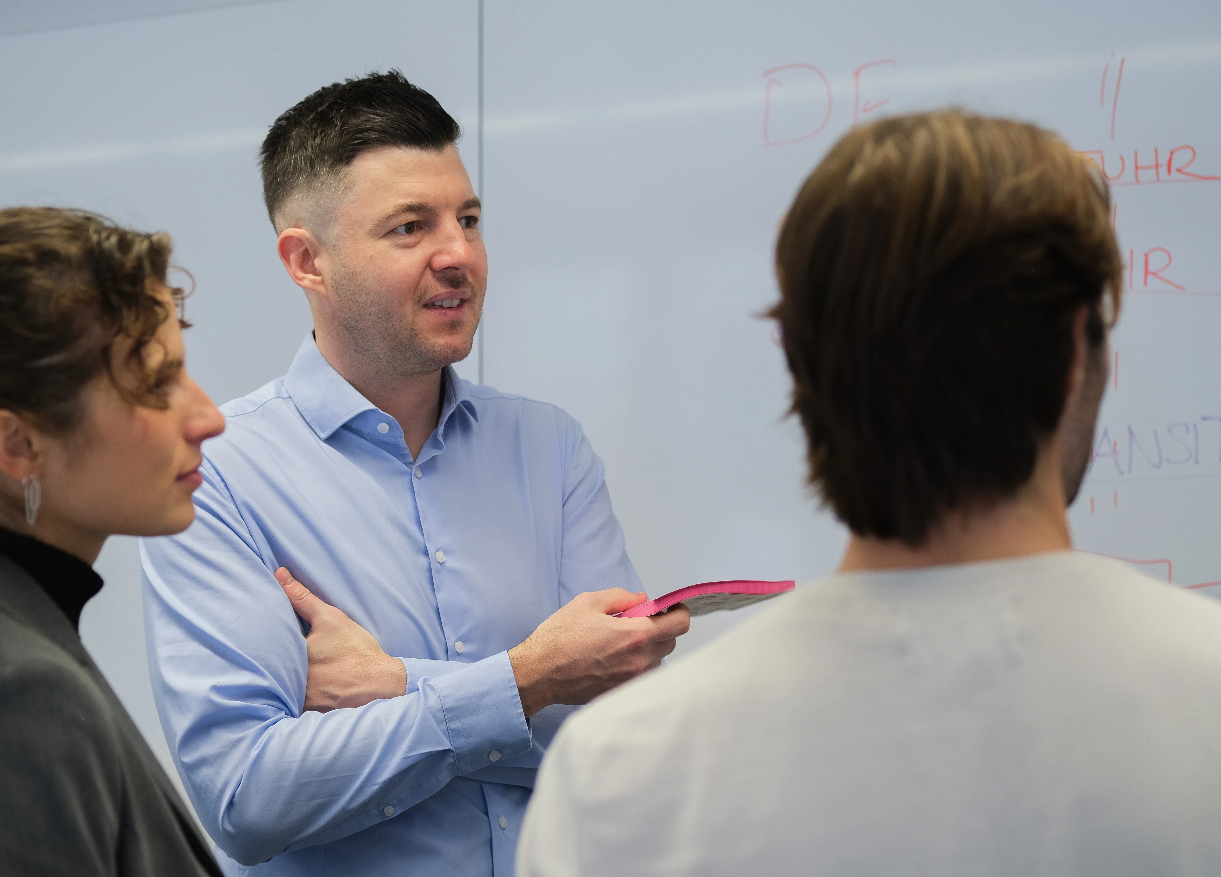 Two Declarium team members in discussion